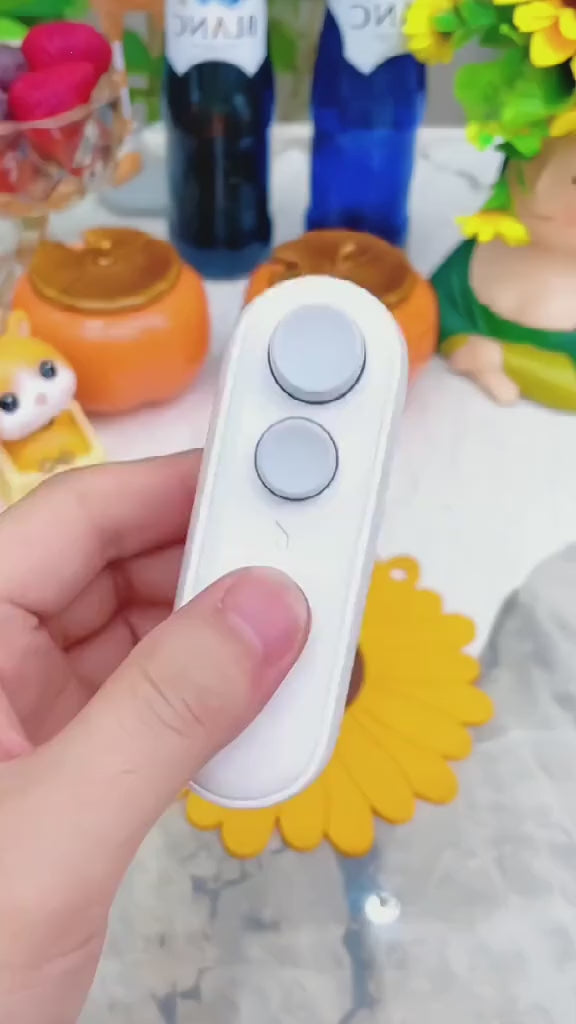 Compact, rechargeable 2-in-1 mini sealer and cutter keeps your snacks perfectly fresh. Smart, magnetic, and ultra-portable.